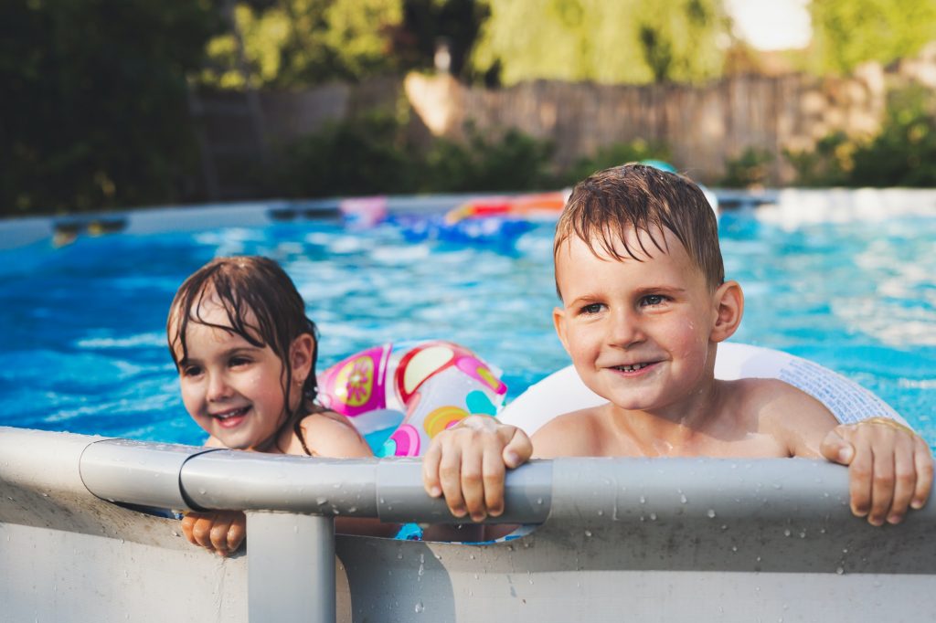 Picture of little kids enjoying in swimming pool